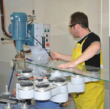 Our worker in processing glass